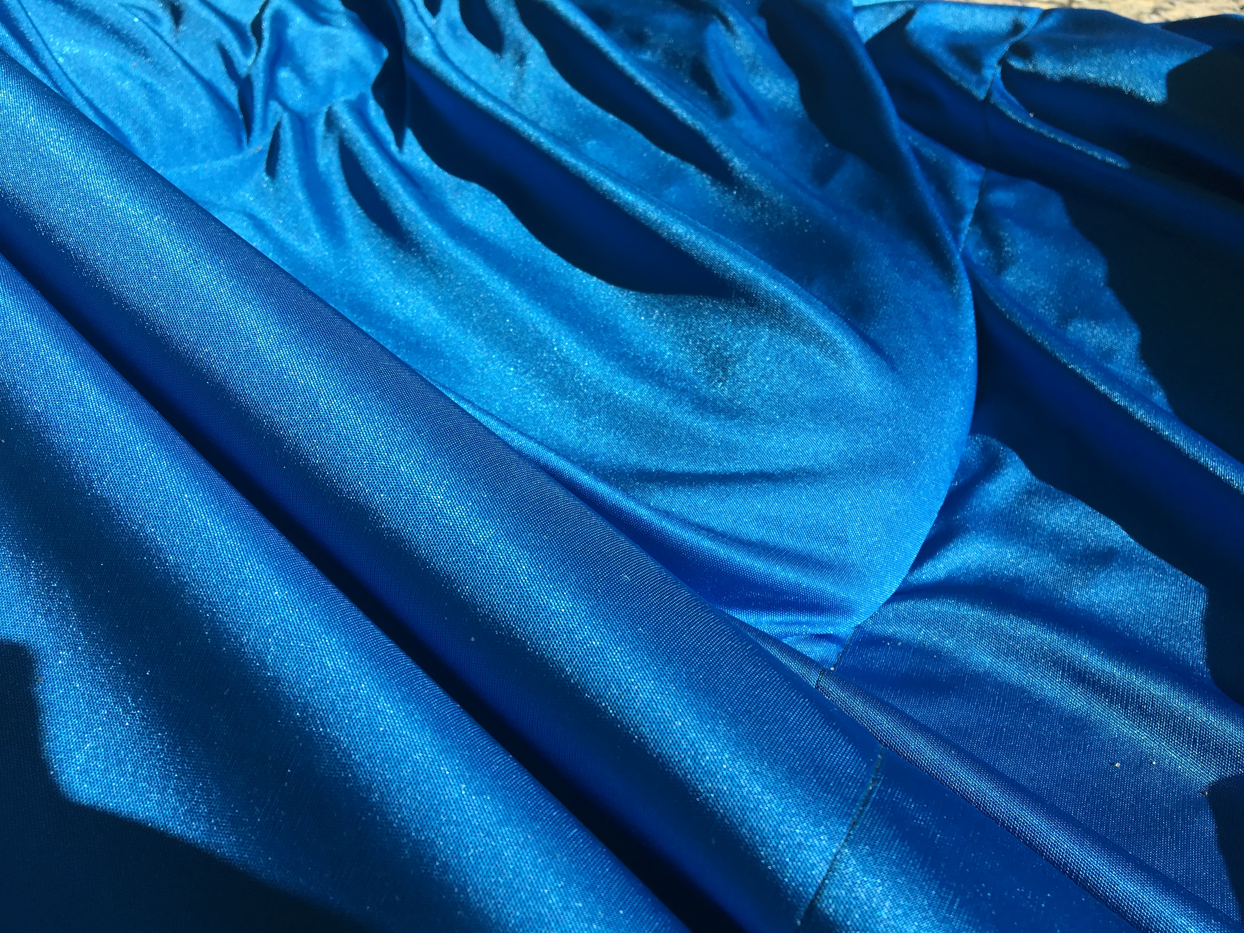 blue fabric and sand